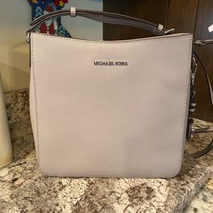 Michael Kore Jet Set Travel Large Messenger.  Grey leather bag.